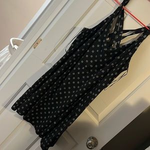 Black and white star knee length dress.